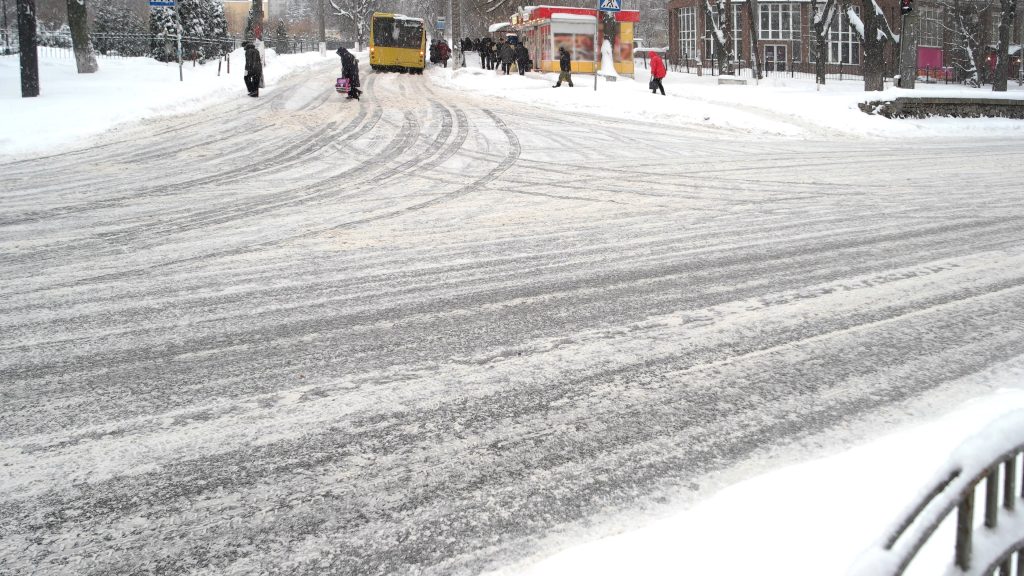 icy city road covered with snow 2024 09 20 16 22 33 utc - Garelli Pavement Service